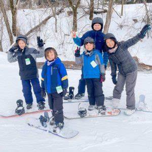 Group posting for photo on the slope